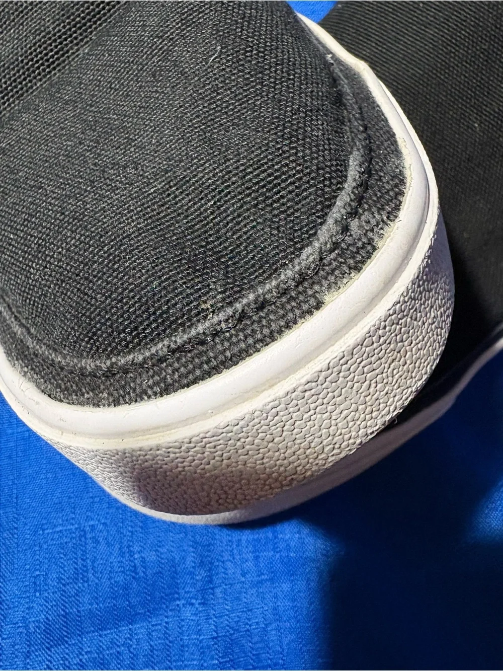 Nike Black Slip-On Canvas Sneakers with White Swoosh